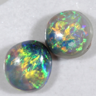 SOLID SEMI BLACK OPALS Matching pair, Bright fire of orange green and blue